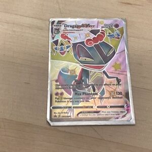 Dragapult VMAX Pokémon Card comes with sleeve